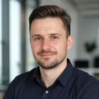 Professional author portrait of a Polish adult, wearing smart casual attire with a neutral expression, suitable for a casino 